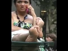 Observing my voluptuous Latina neighbor's pretty soles outside